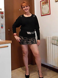 Sexy granny redhead with hot shapely legs